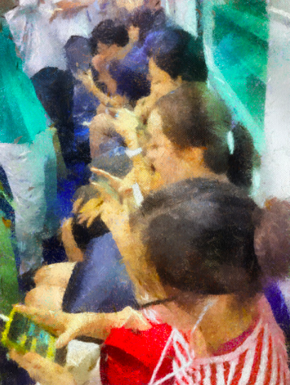 서울의 지하철 내부 모습. 좌석 한칸에 앉은 승객 전원이 스마트폰을 보고 있는 광경이 드물지 않다.